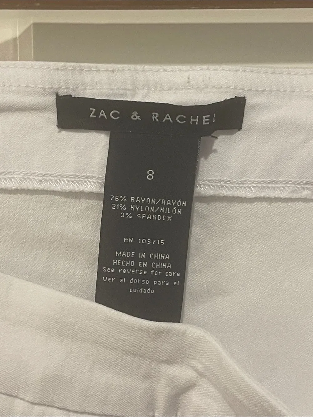 White Women's Ruffle Hem Capri Jeans